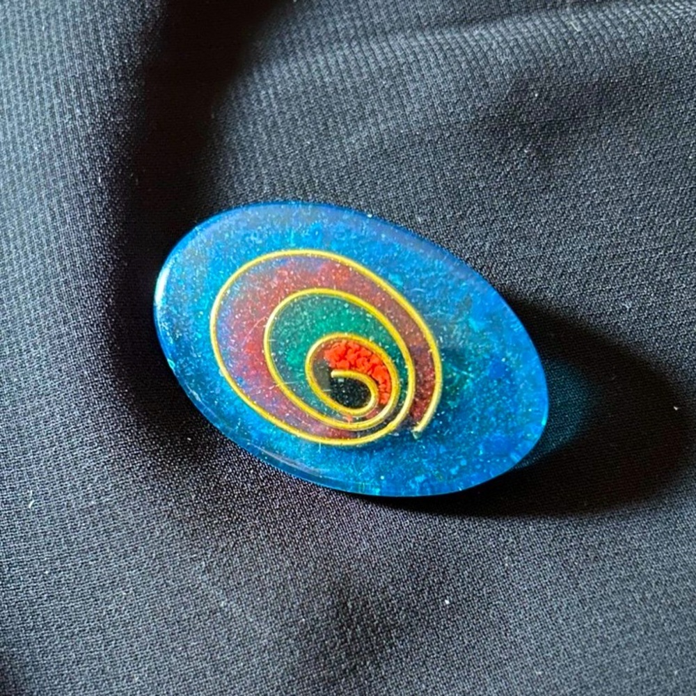 Handmade Blue resin brooch with painted gold swirl. Unsigned